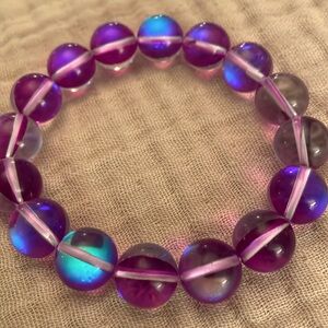😎 NWB Magic Color Glass 12mm Beaded Stretch Bracelet. Unique and contemporary.